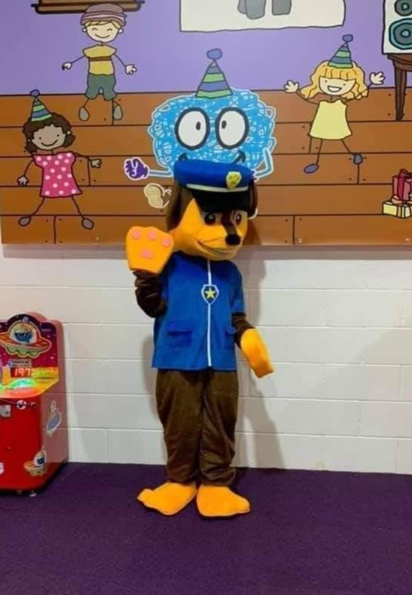 Police puppy character mascot costume available for hire at Buddies Play Den in Clay Cross near Chesterfield.