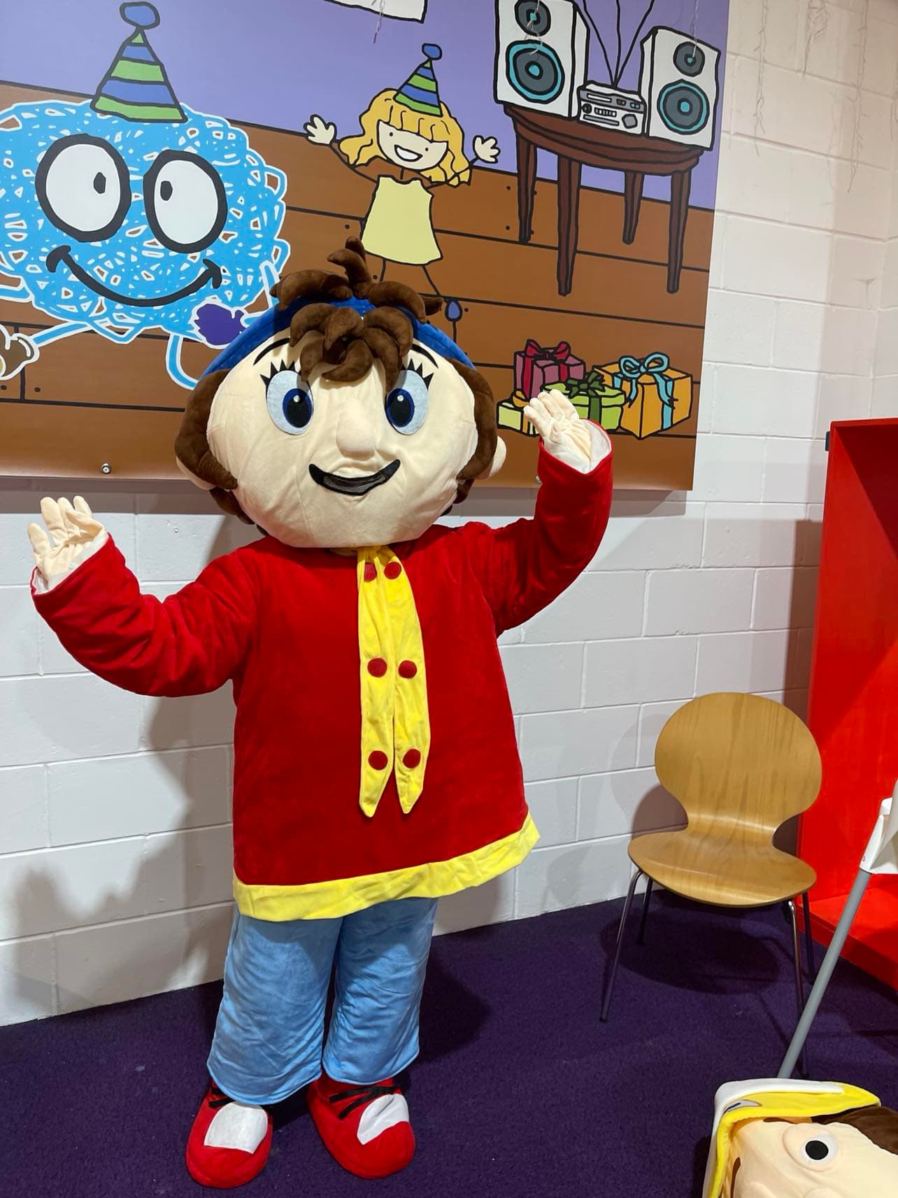 Blue hat character mascot with bell available for hire at Buddies Play Den in Clay Cross near Chesterfield.