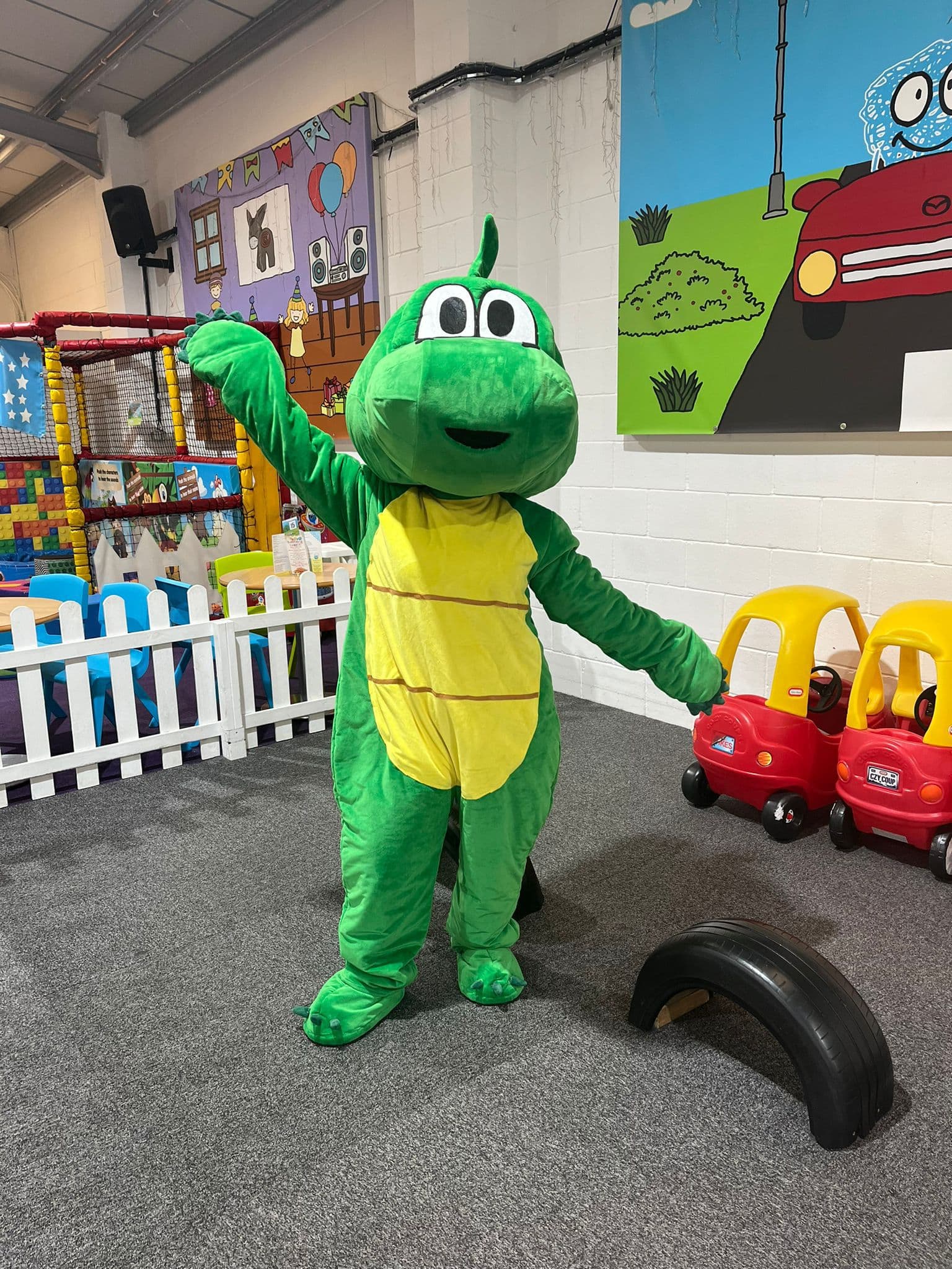 Dinosaur character mascot costume available for hire at Buddies Play Den in Clay Cross near Chesterfield.