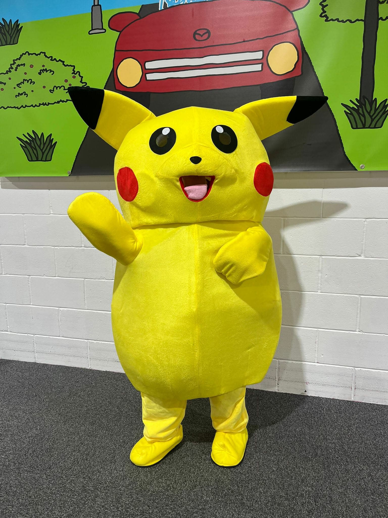 Yellow electric mouse character mascot costume available for hire at Buddies Play Den in Clay Cross near Chesterfield.