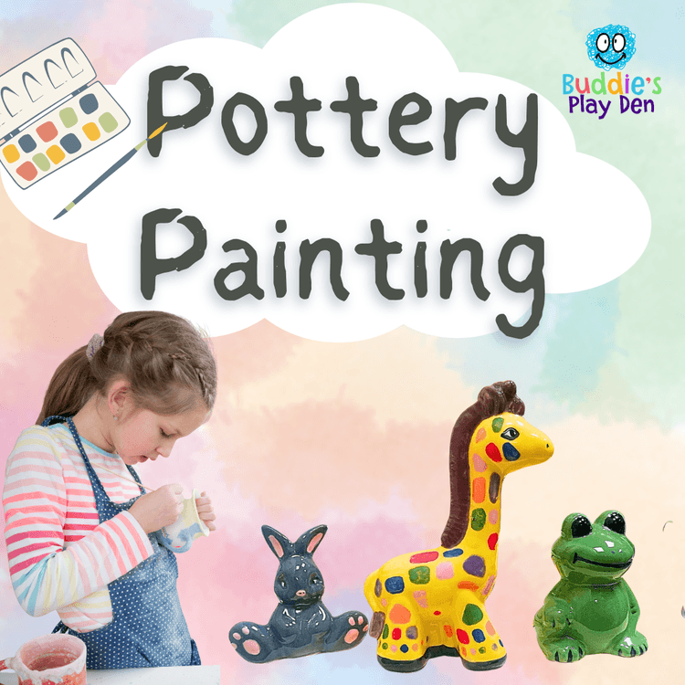 Child painting pottery during a soft play visit at Buddies Play Den in Clay Cross near Chesterfield.