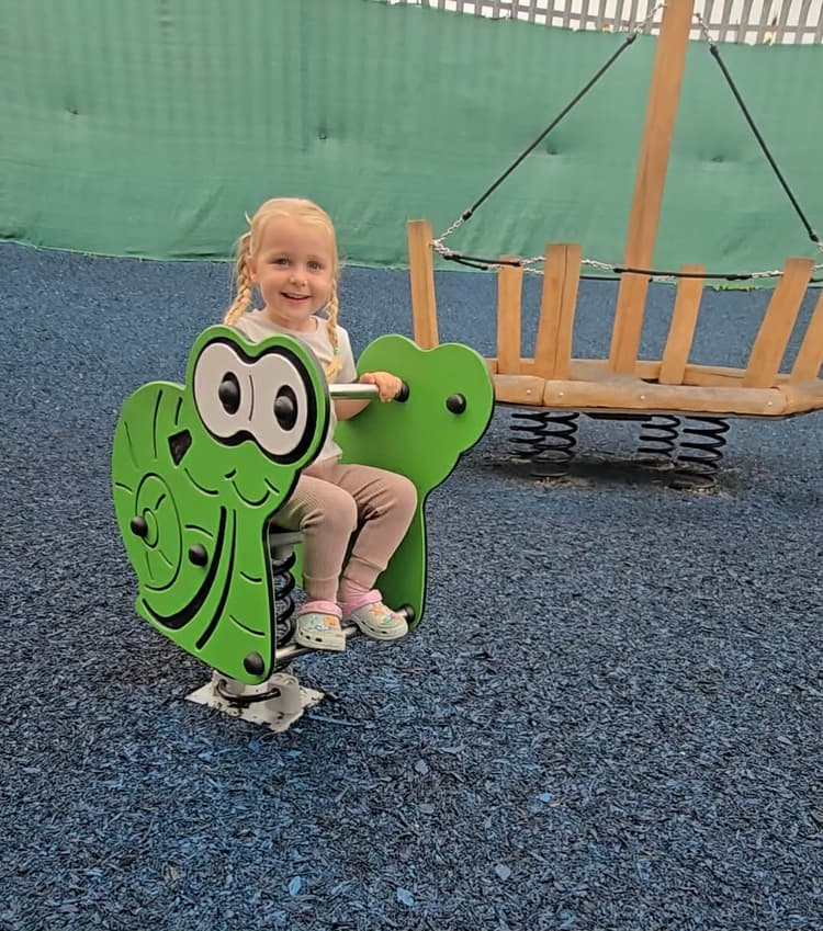 Outdoor frog bopper play feature at Buddies Play Den in Clay Cross.