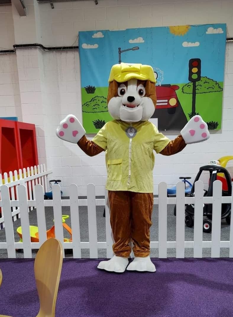 Construction puppy character mascot costume available for hire at Buddies Play Den in Clay Cross near Chesterfield.